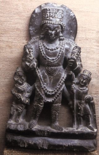 The image depicts Bhagavan Surya Deva with Danda and Pingala as attendants.